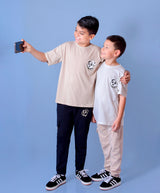 Conjunto niño en tela algodón estampado panda, en jogger burda estampada.